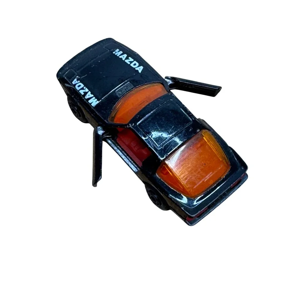 Vintage 1980s matchbox Mazda RX-7 Toy Car Black Diecast Collectible doors open‎